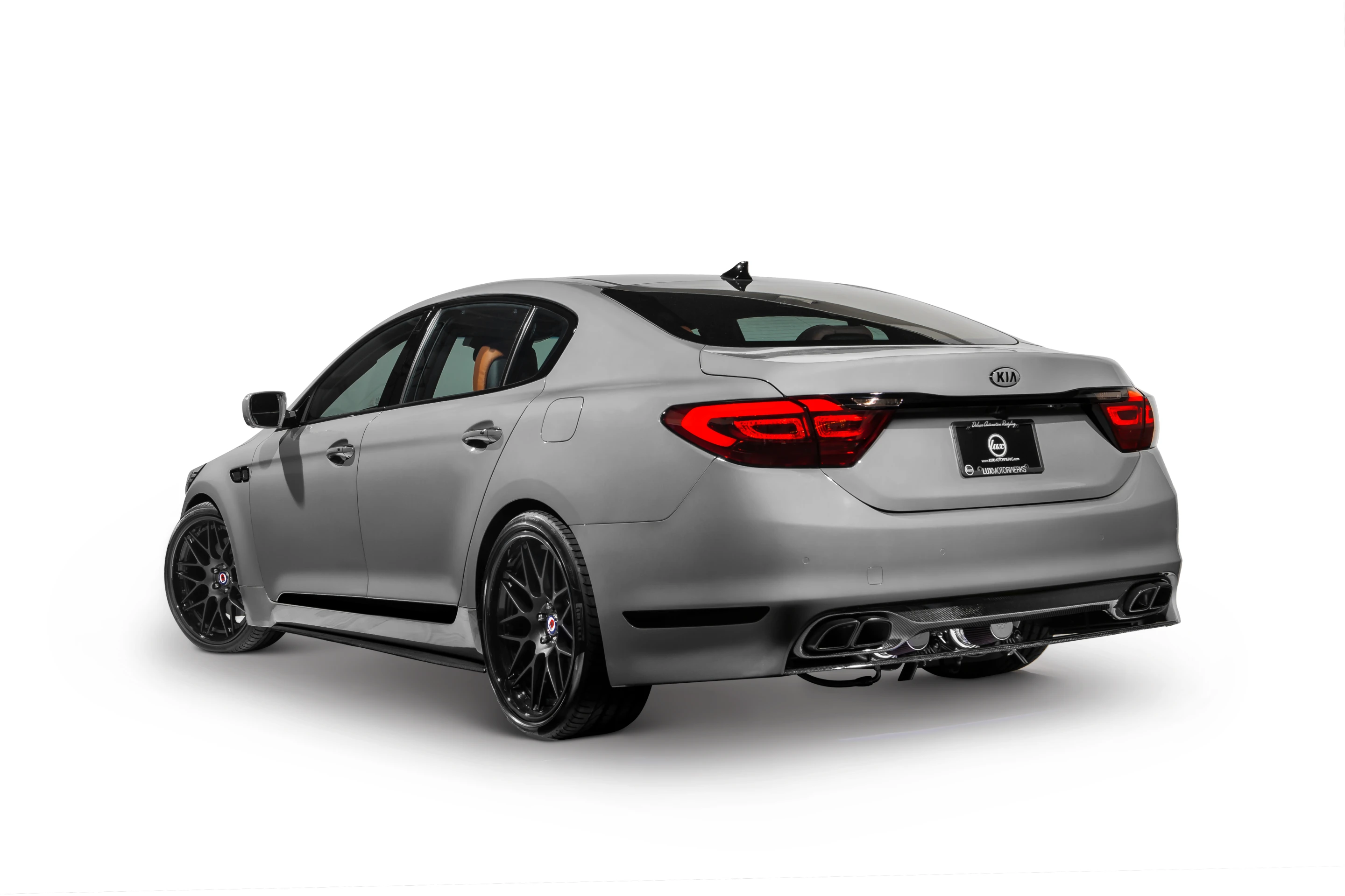 21-inch gloss black wheels are wrapped in Pirelli tires