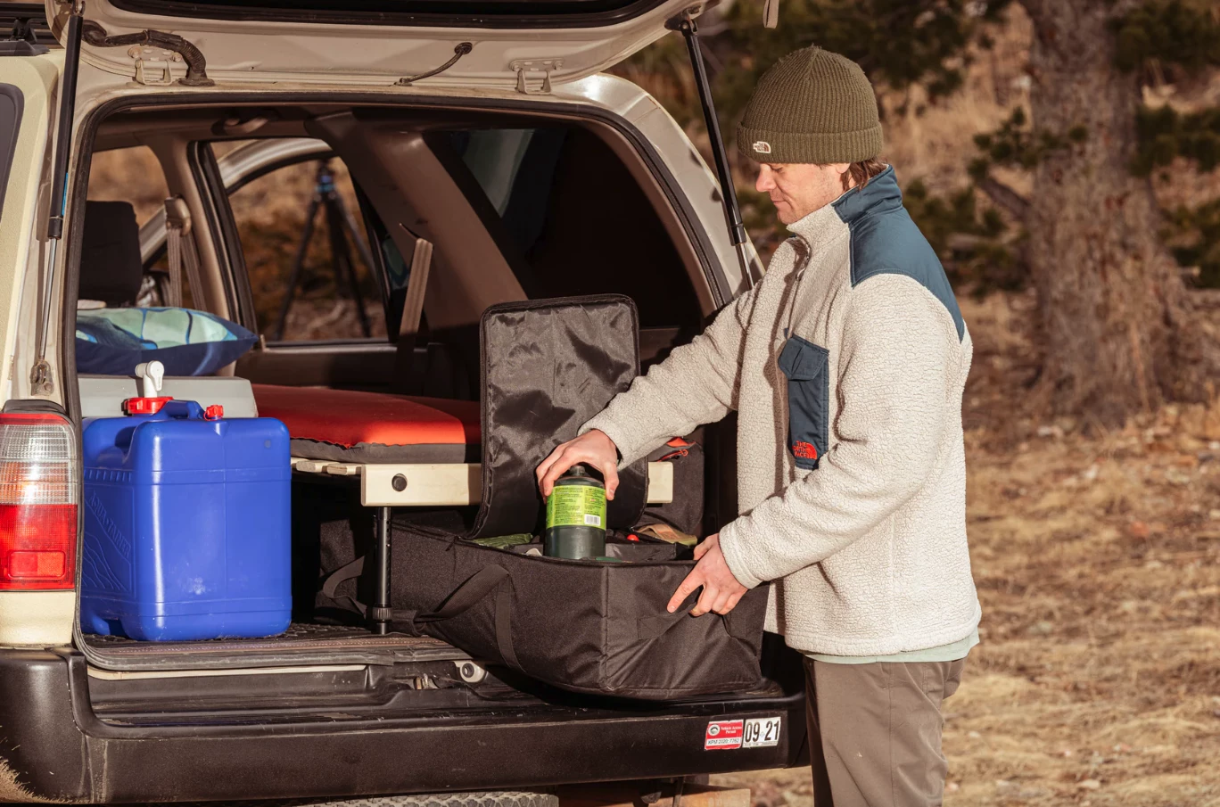 With its top zipper and retractable dividers, the Hele Box carry bag doubles as a campsite organizer drawer
