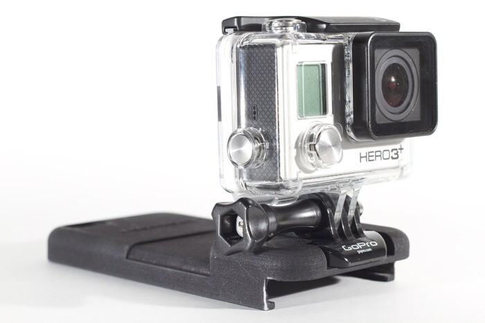 The camera quickly snaps in and out of a mounting point on the case