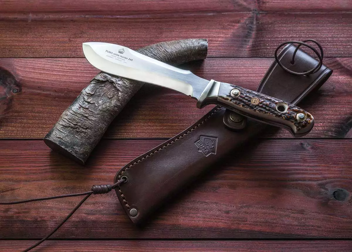 The Puma White Hunter has a stainless steel blade