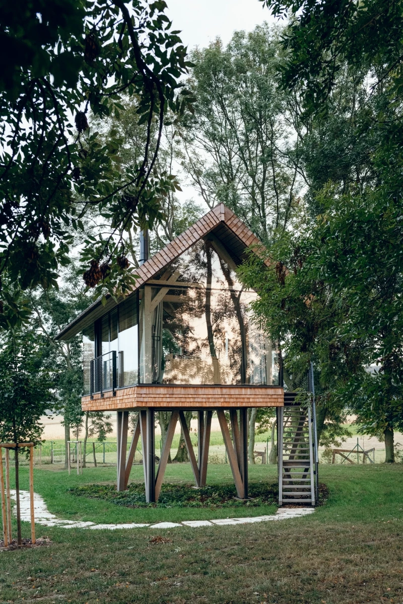 Nestled in the tranquil landscape of Hainburg an der Donau, Austria, Zen House exemplifies a harmonious union between tiny design and nature