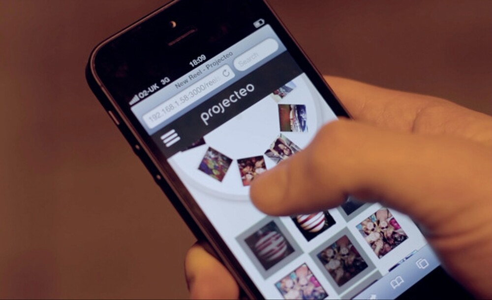 A companion iPhone app is used to select images from an Instagram account and arrange them in the circle formation