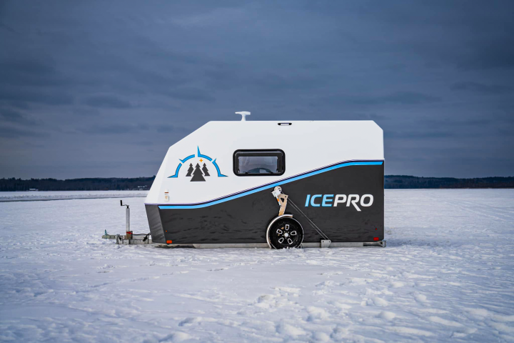 The IcePro's manual winch axle system drops its floor down to the ice for drilling and fishing