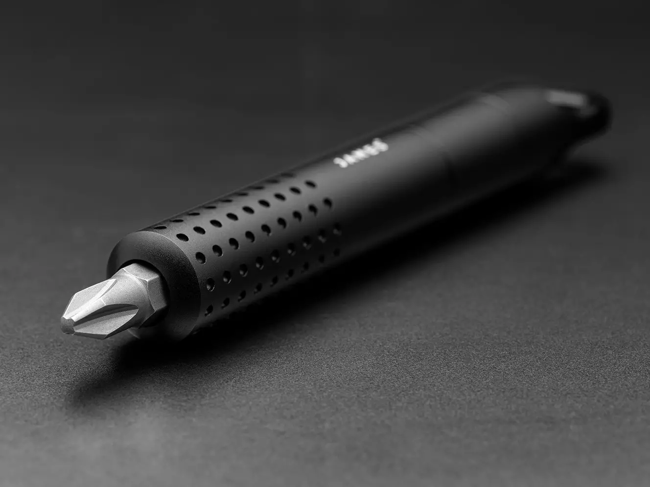 The Cache River tool is shaped like an oversized pen, with a magnetic bit holder found where the nib would be