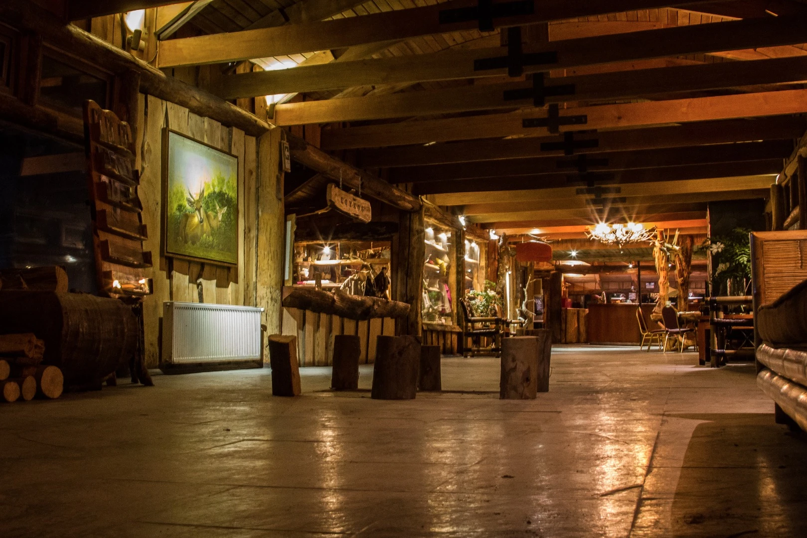 Aside from stone flooring, every surface presents tasteful wooden finishings