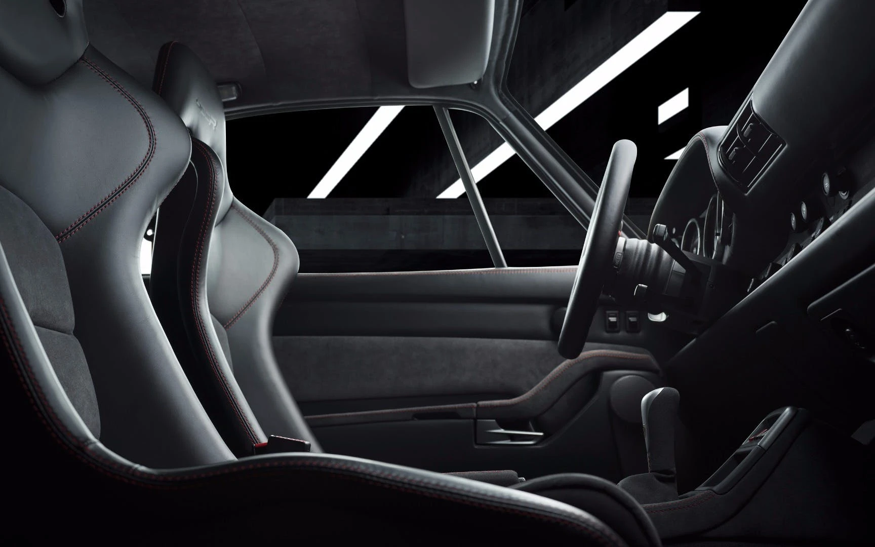 The driver and passenger sit in carbon buckets in the 400R