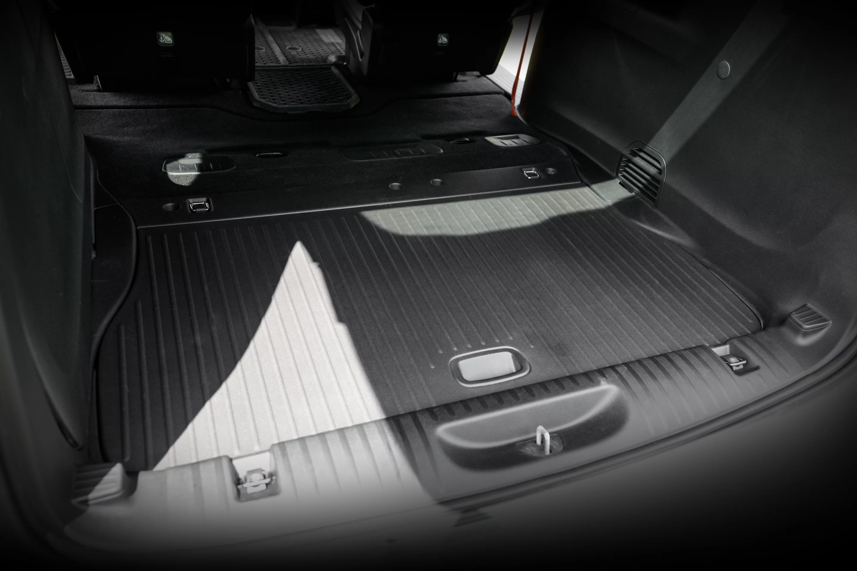 Chrysler replaces the third-row seats with concept cargo floor panels that increase cargo/sleeping area
