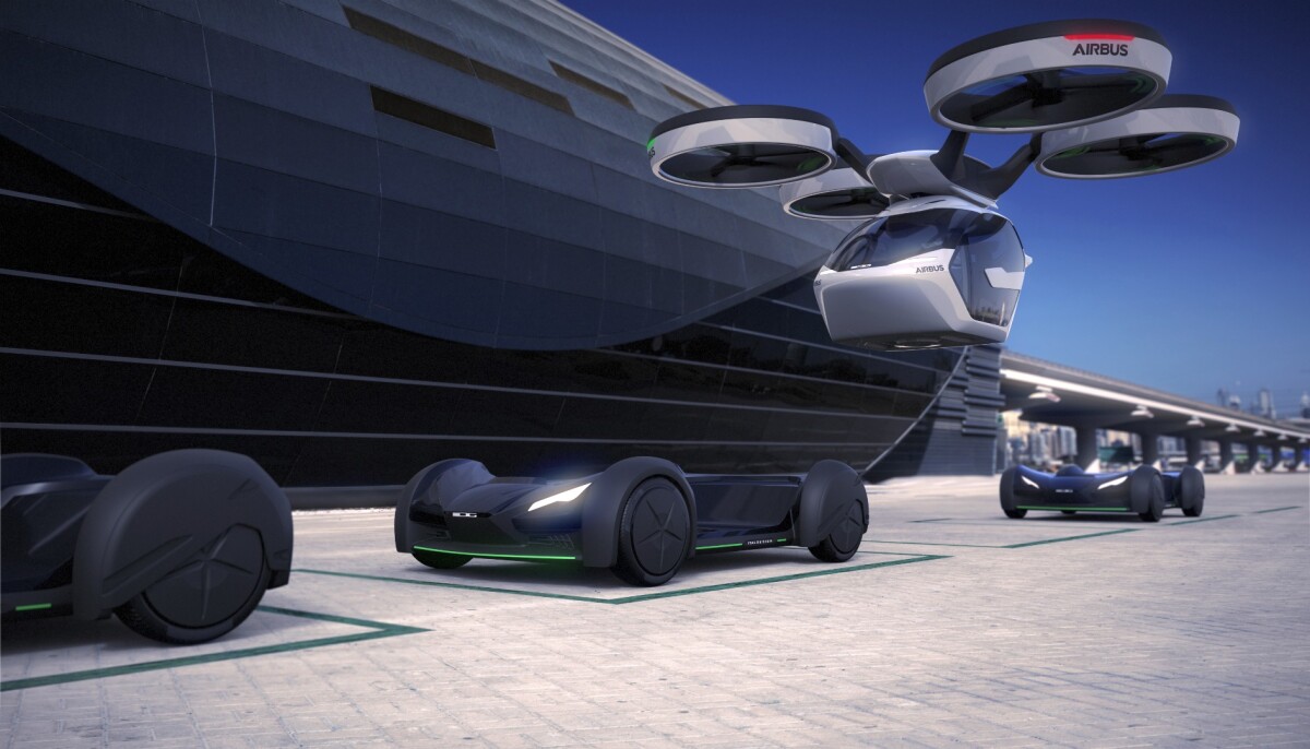 The multicopter prepares to drop the passenger cell on a ground chassis