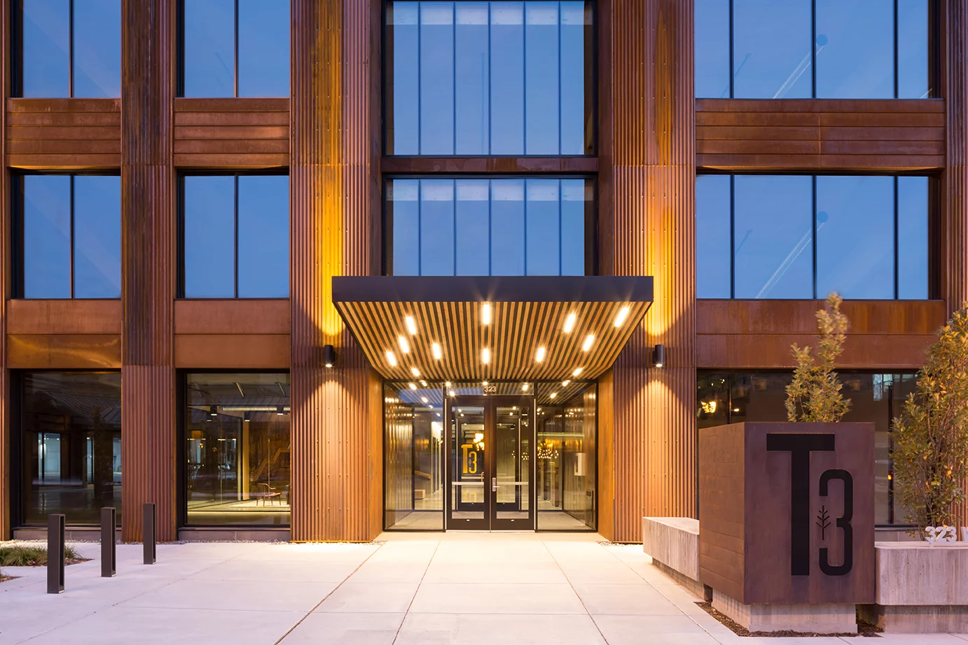 T3 is clad is weathering steel, which complements the aesthetic of the wooden structure