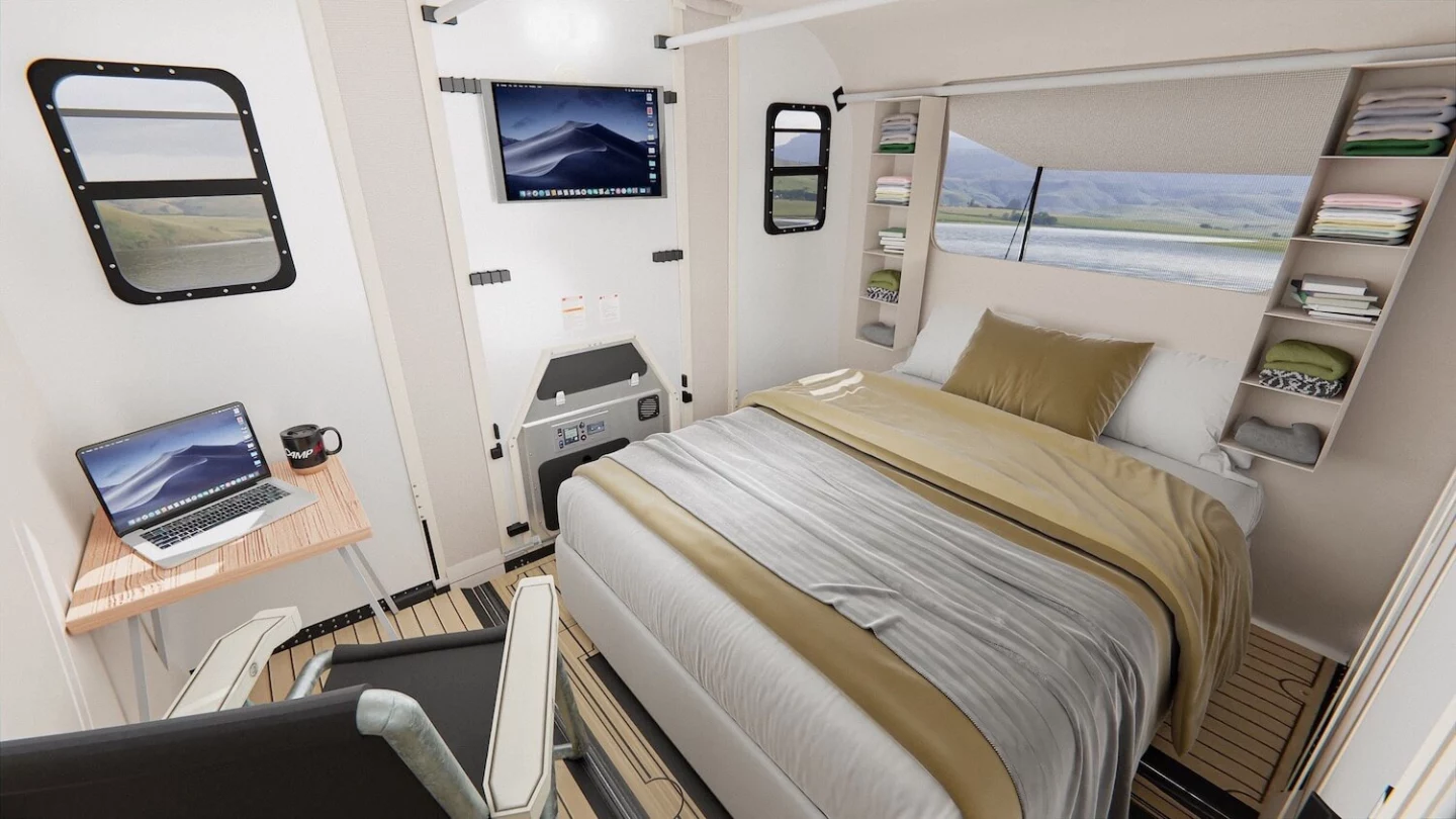 Camp365 Model T interior with queen bed and workstation