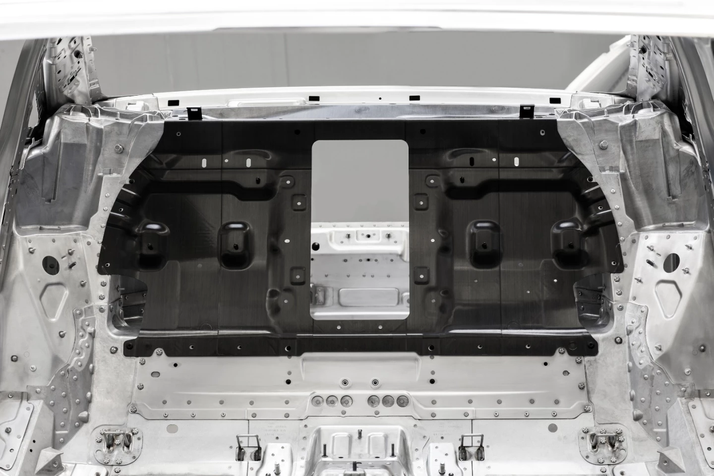 The single largest piece on the A8 chassis is the rear of the passenger cell
