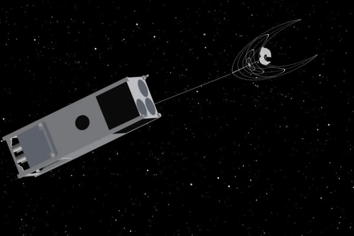 An illustration of OSCaR netting a piece of space junk