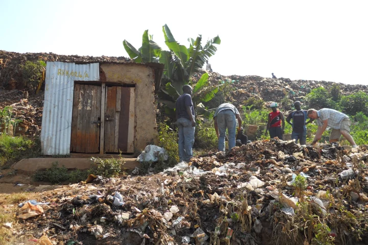 Before construction begins, the team have to dig out layers and layers of garbage