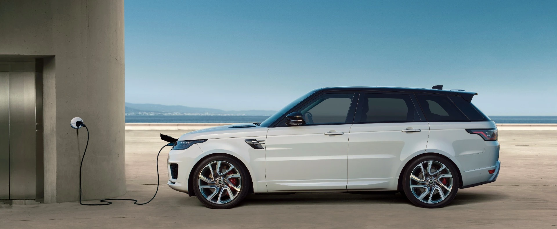 The Range Rover Sport plugged into the wall