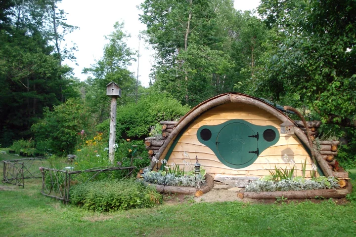 A multipurpose Hobbit Hole that can be used as a playhouse, or a storage shed for gardening tools and supplies (Photo: wooden-wonders.com)