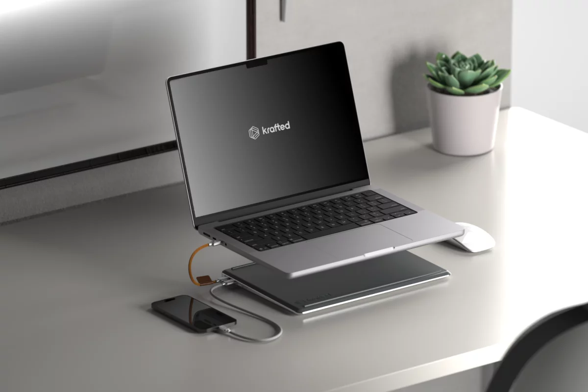 The tapered Edge power bank slides under a laptop and provides charging power on the move