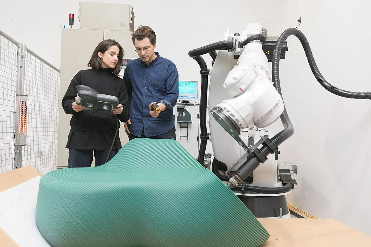 New Raw's robotic arm 3D printer transforming plastic waste into street furniture at the Zero Waste Lab