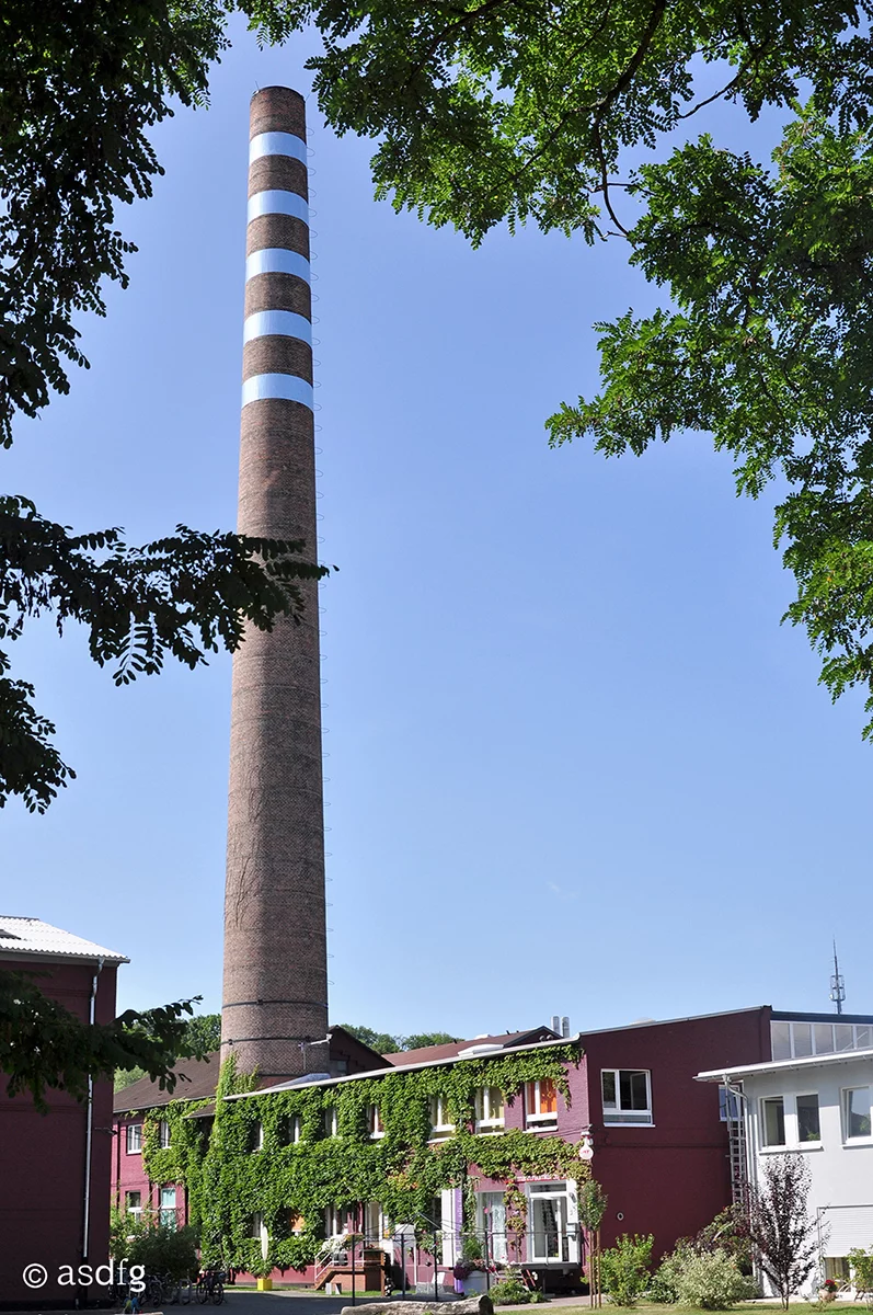 Glance up at the tower and the you will be met by the disarming sight of alternating floating and missing sections of chimney stack (Photo: asdfg)