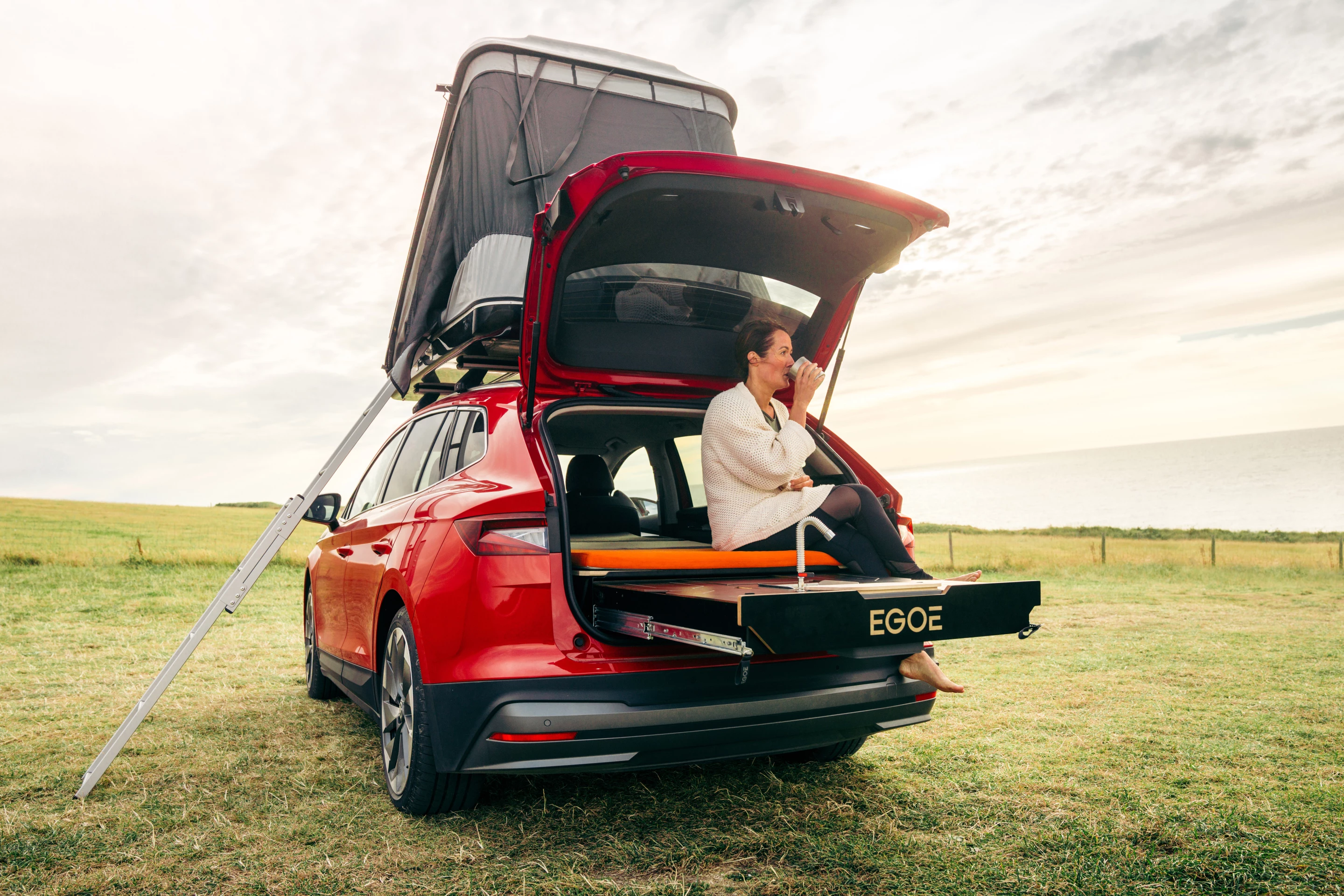 Enjoying the morning in the Skoda Enyaq iV 80 micro-camper