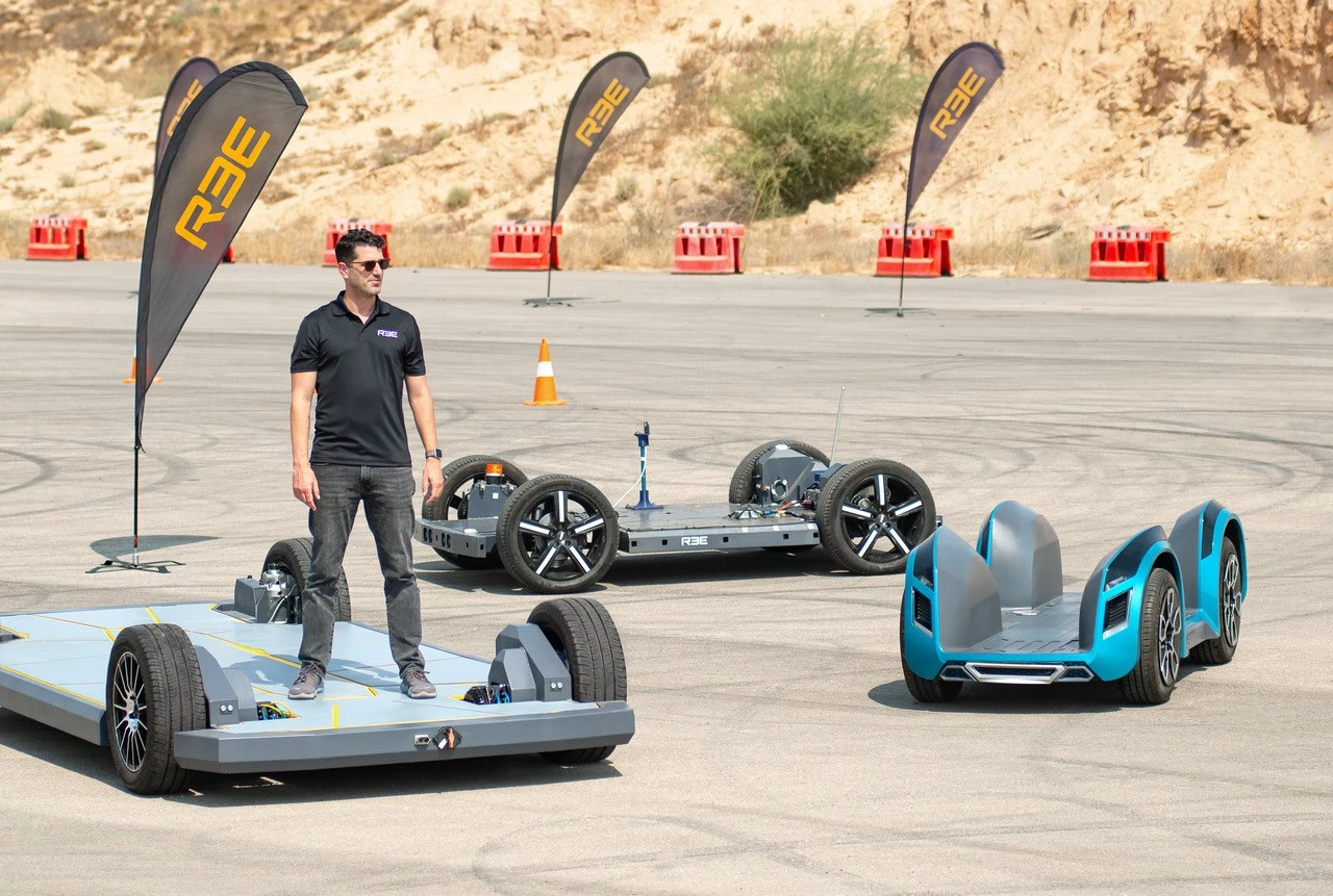 REE CEO and co-founder Daniel Barel rides the biggest skateboard (EV chassis) in town