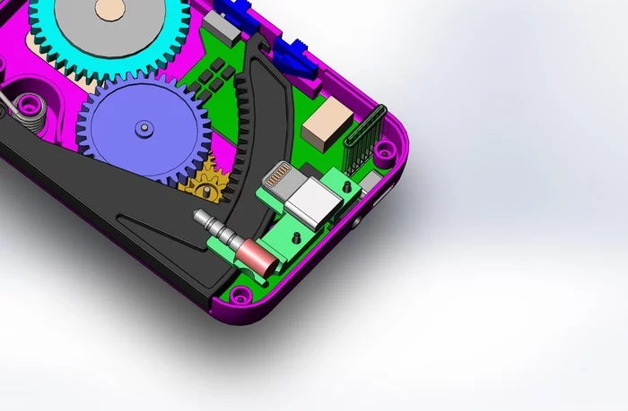 Pushing the lever down spins a magnetic dynamo inside the case and charges a built-in 400 mAh battery through electromagnetic induction