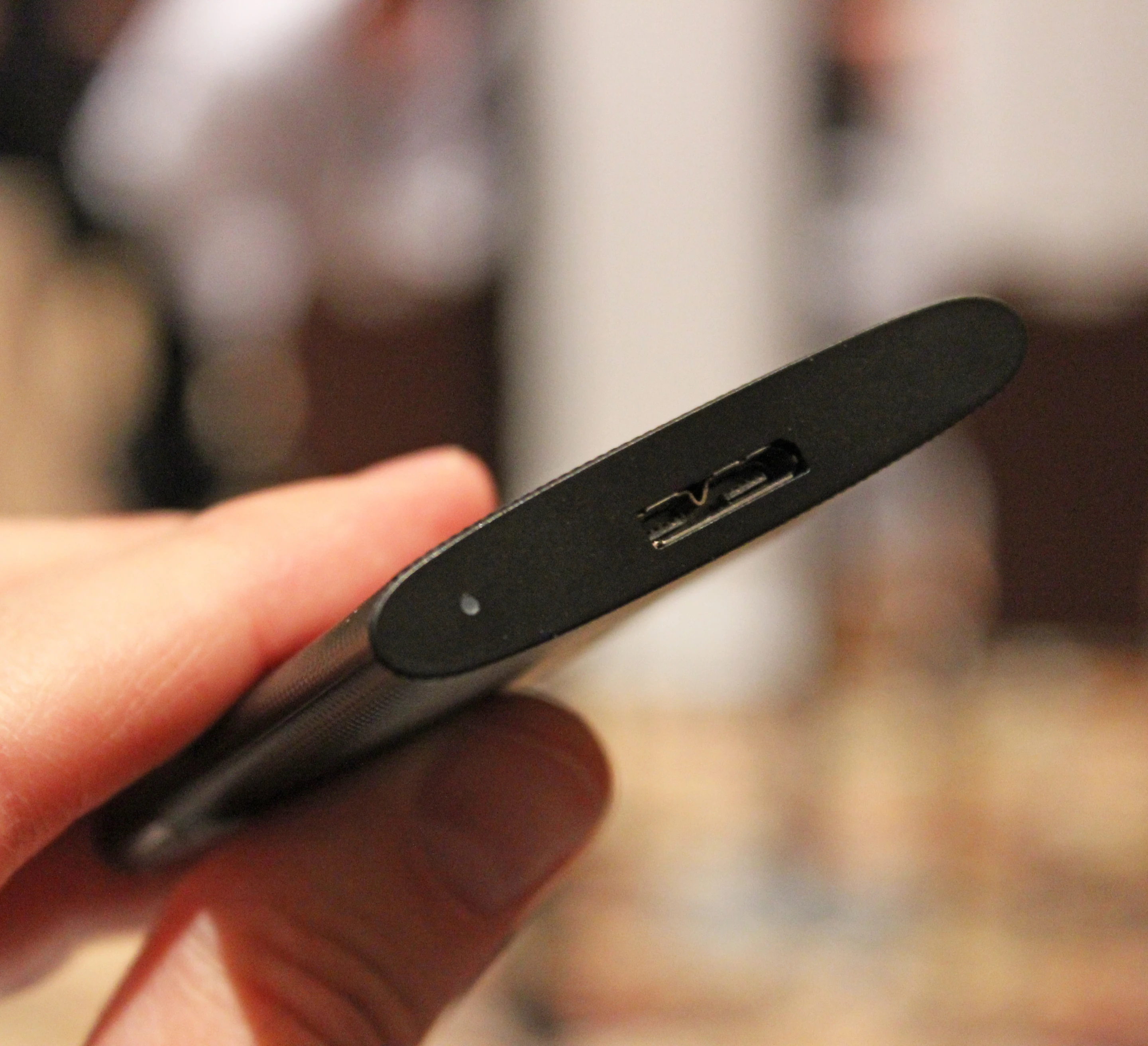 The unit felt very small and thin when Gizmag had some hands-on time with it at Samsung's CES booth (Photo: Will Shanklin/Gizmag.com)