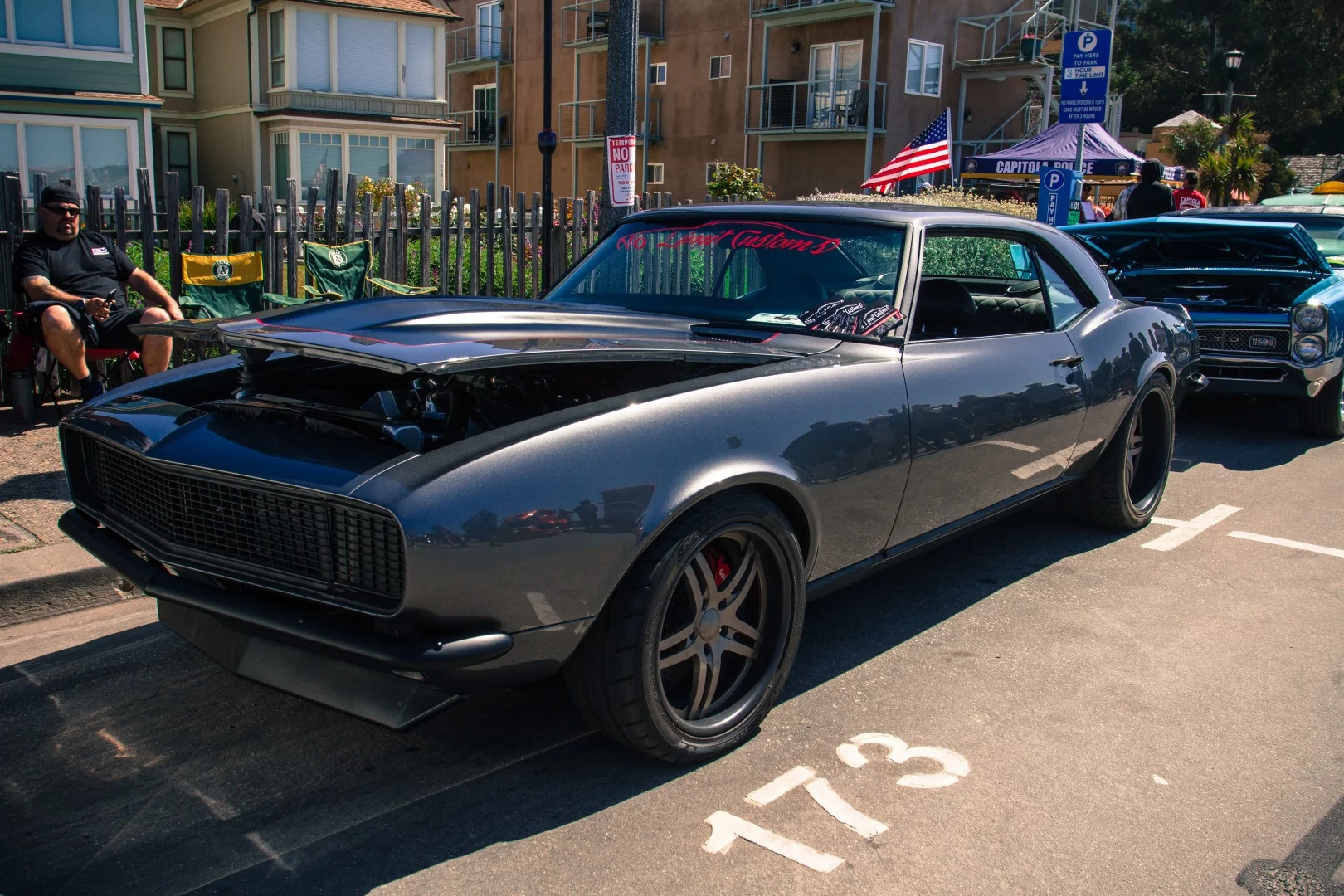 A 1968 Chevy Camaro completely murdered out. Very slick, very cool