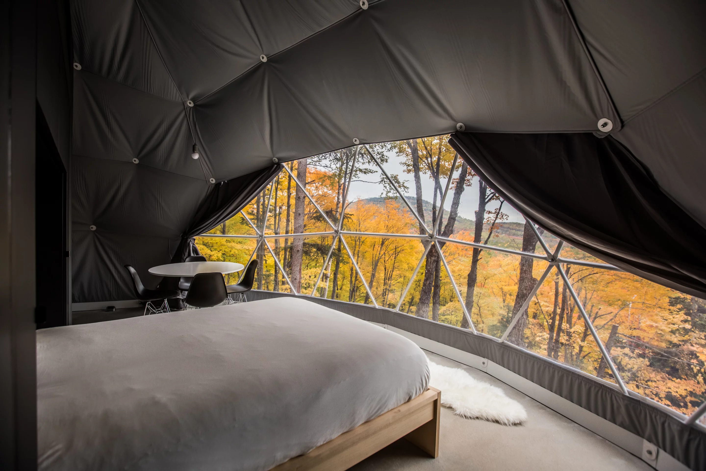 The drapes can also be drawn back to reveal the breathtaking views across the valley, with exclusive views of the Saint-Laurent river