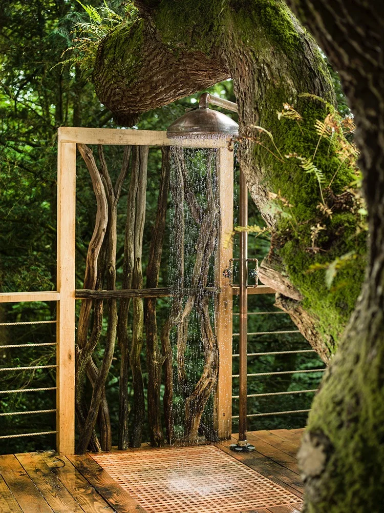 The Woodsman's Treehouse includes an outdoor shower