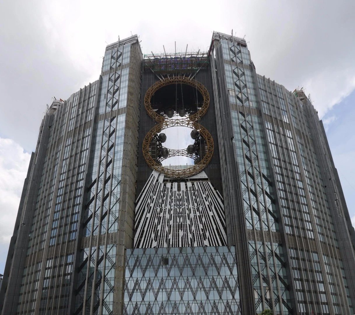 The move-inspired design is said to be based on the idea of two flaming asteroids crashed through the building, leaving two large holes around which the figure-eight shape is made