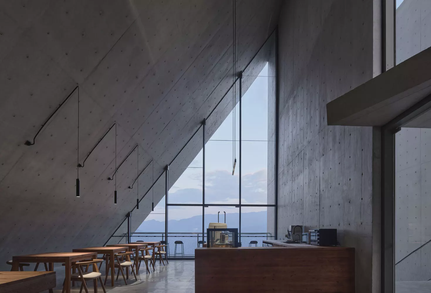 A café with a sloping roof adds an element of spiritual openness