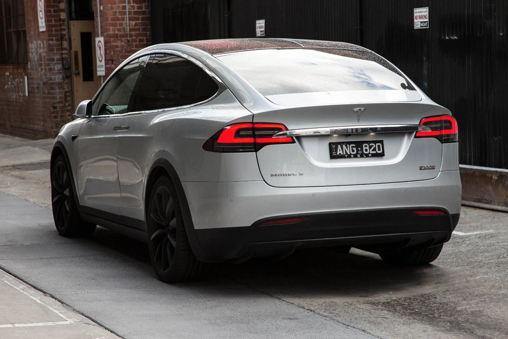 The hunchbacked Model X lying silently in wait