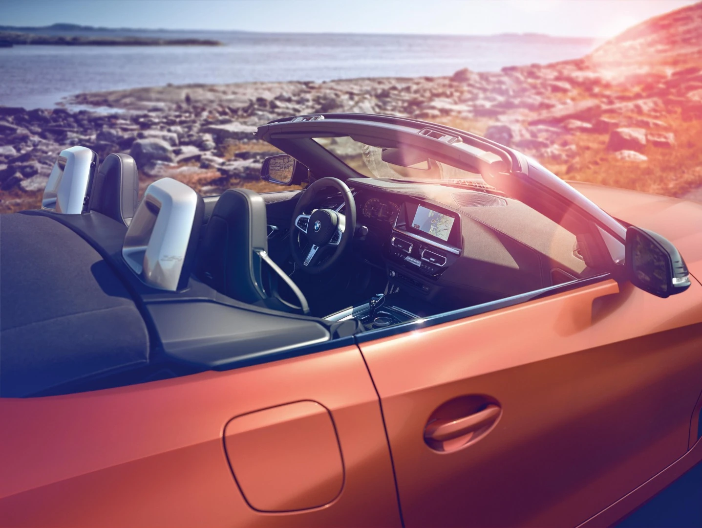 The BMW Z4 M40i First Edition is an M Performance model of the car that includes several sophisticated equipment features and an exclusive Frozen Orange metallic paint color