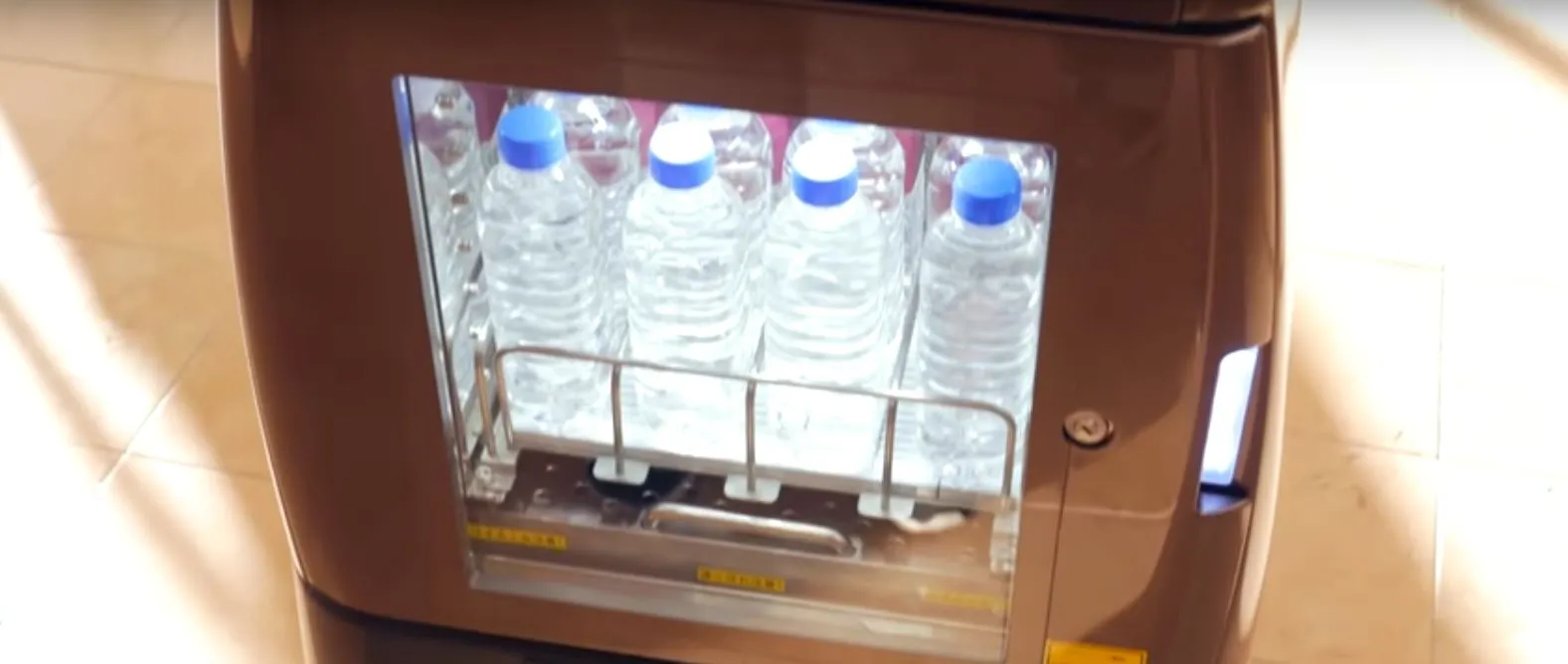 The HOSPI(R) Autonomous Delivery Robot can out water to hotel guests