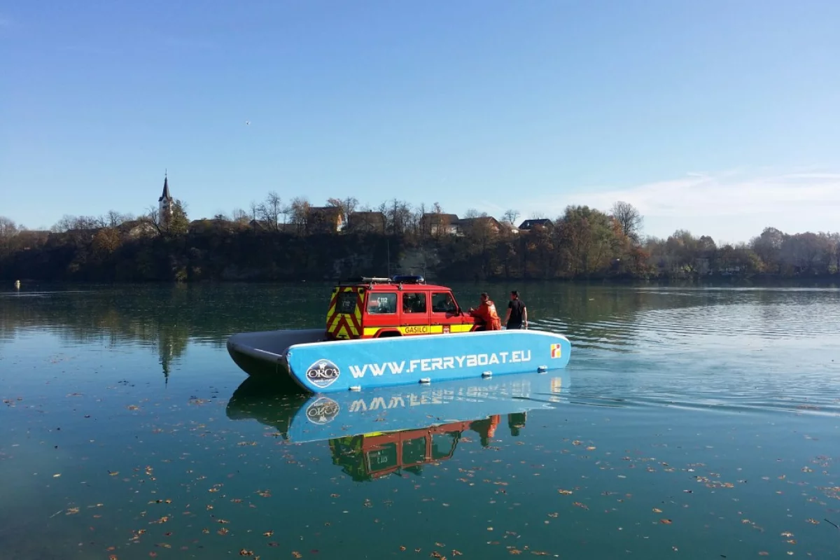 The Hovercraft Ferryboat transporting a vehicle across a lake