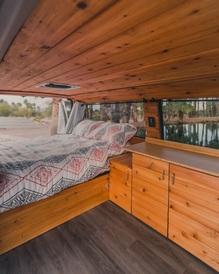 A big part of the Boho conversion is the soft-wood (pine or cedar) interior paneling and vinyl flooring – looks like a place we could live for a while