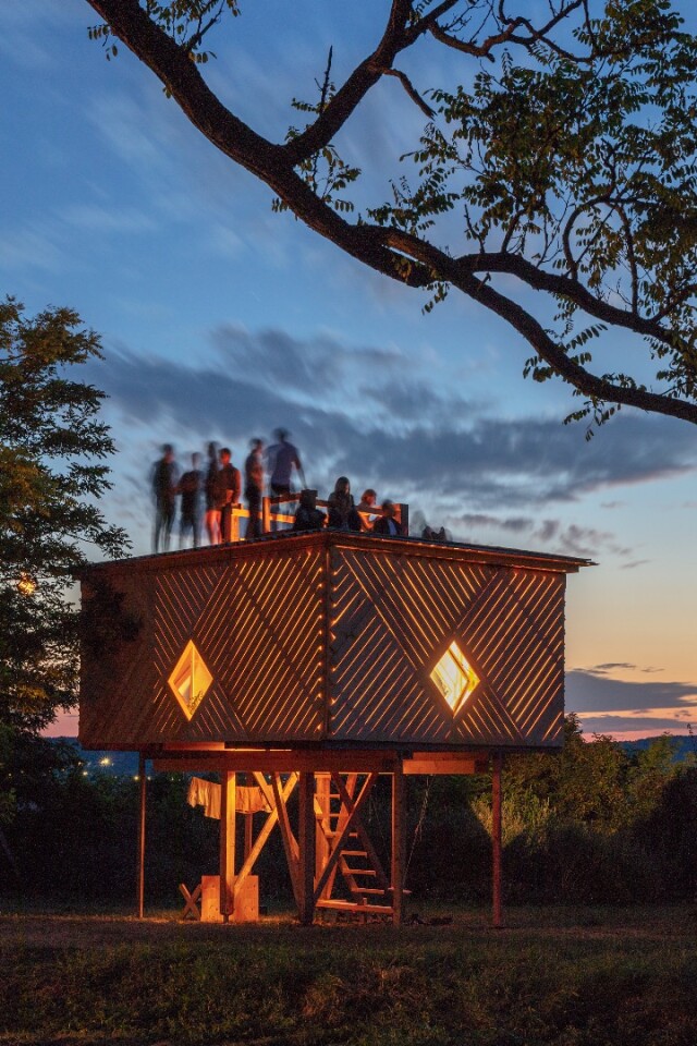 I am a monument is raised on stilts and provides shade on the ground, while its second floor offers a private space suitable for rest and relaxation