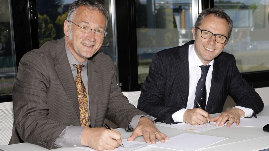 Stefano Domenicali, CEO Automobili Lamborghini (left) and Mauro Ferrari, PhD, CEO of Houston Methodist Research Institute, sign agreements in Italy