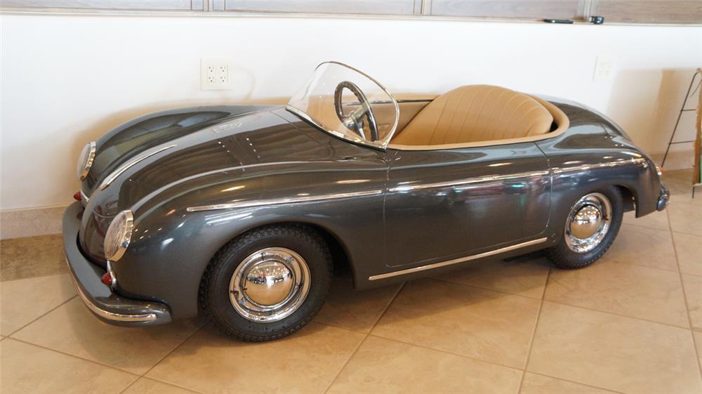 Selling for $10,350, this vintage Porsche 356 speedster convertible isn't a pedal car, but a go-kart which had been restored to as-new condition. The Porsche is powered by a gasoline engine and has forward and reverse gears, push-button start, working lights and an upholstered interior.