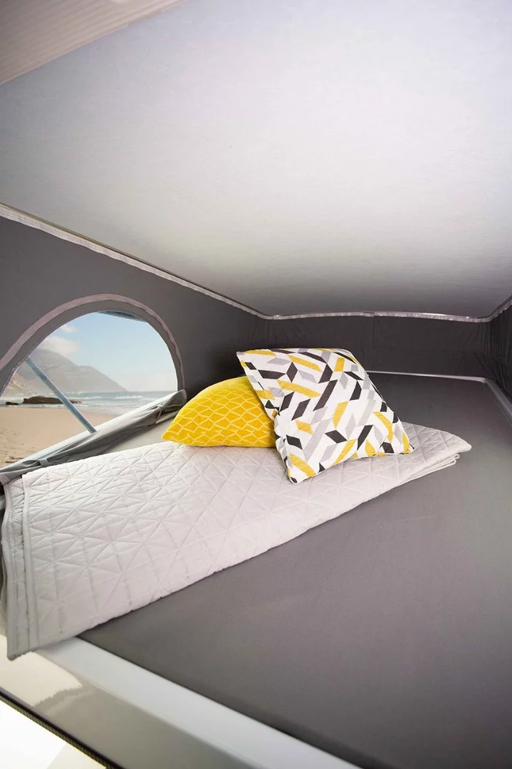 A peek at the 78 x 51-in mattress in the pop-up roof