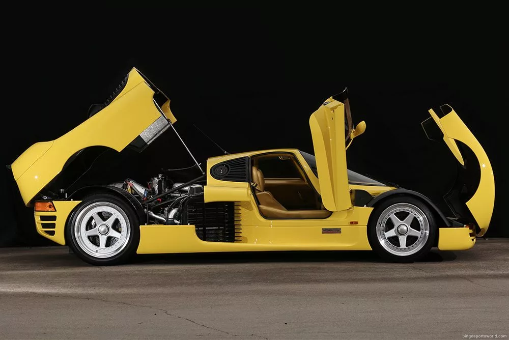 In 2018, Bingo's Chiyoda City showroom in central Tokyo sold a yellow Schuppan 962CR for an undisclosed amount. The car returned to Bingo in 2021 with a total 49,000 km (30,000 miles) on the odometer and was again sold for an undisclosed amount. Bingo's clientele is elite, and amongst a range of other bespoke services, it is the sole Japanese dealership for Bugatti Rimac and Koenigsegg.