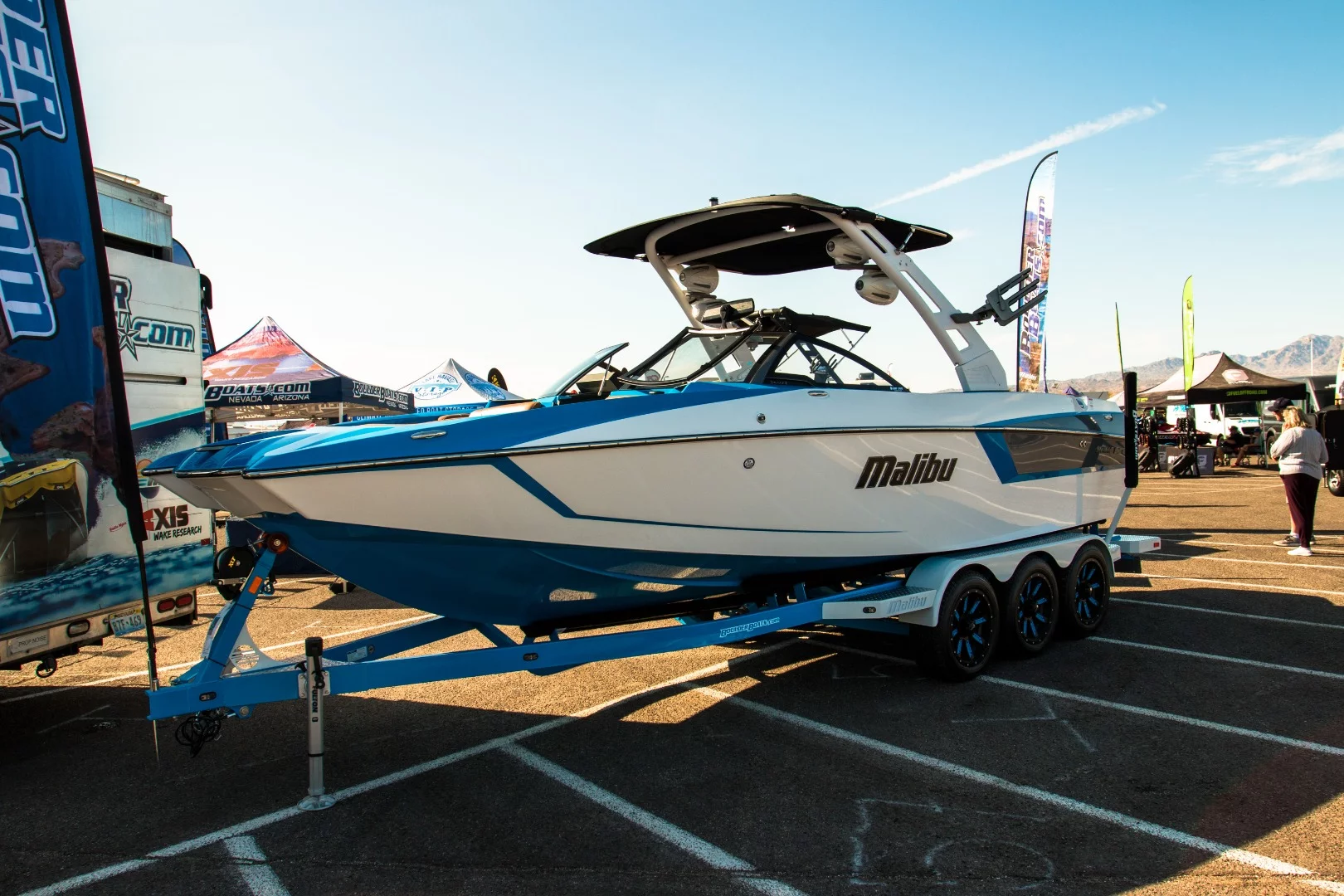 Malibu's MXZ wakeboarding boat, at just under US$155,000, doubles as the ultimate party platform, with comfy guest seating both fore and aft of the driver's seat