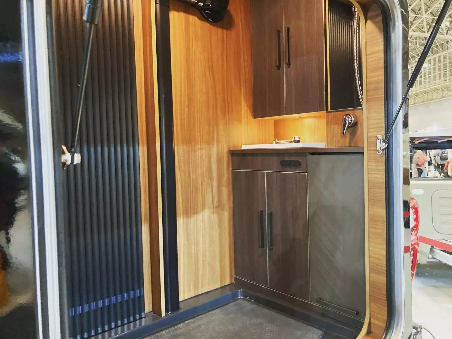 The rear bathroom can be accessed from the tailgate, making it an ideal place to store wet, dirty gear