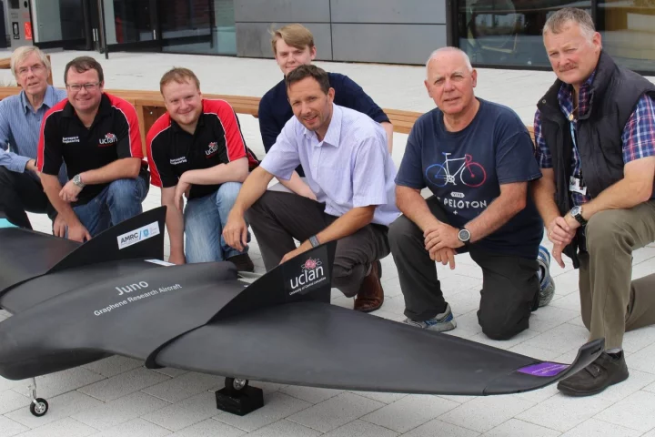 Members of the engineering team pose with Juno