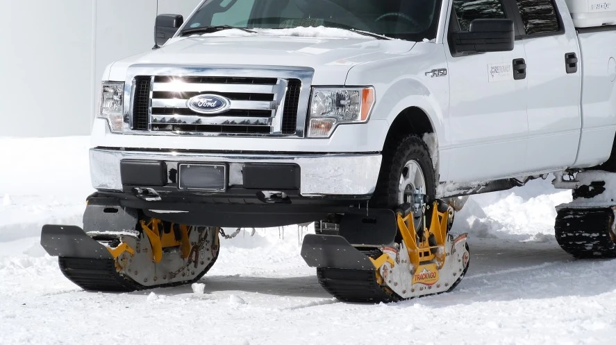 The front tracks pivot with the front wheels when turning, up to 30 degrees