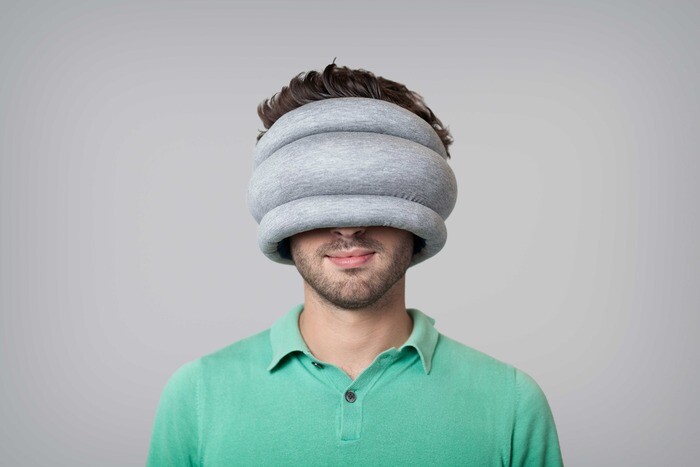 The Ostrich Pillow Light is adjustable to fit all heads, and covers your eyes and ears to block out light and noise