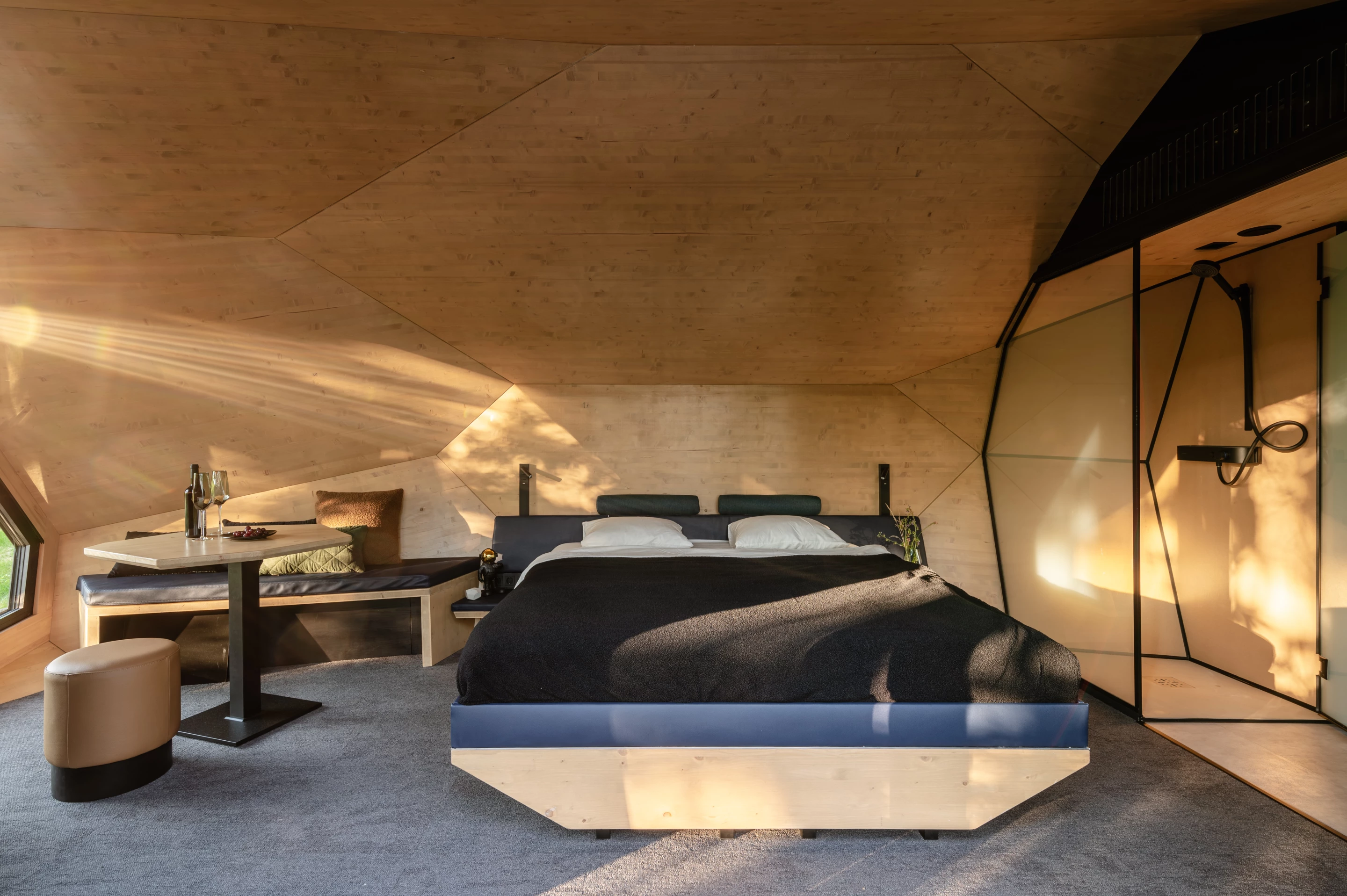 The Pebl Grand's sleeping area features a large king-sized bed