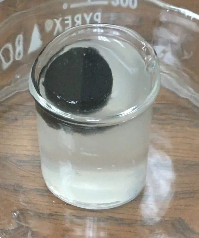 A hydrogel tablet purifying a glass of water
