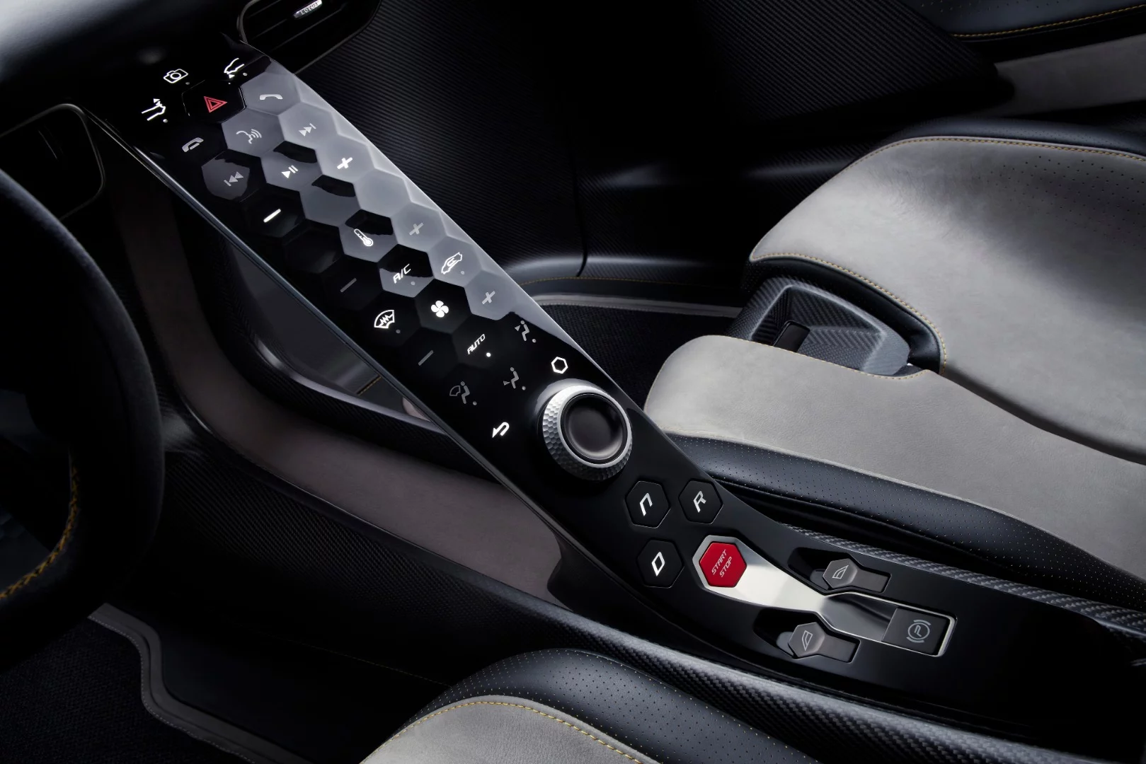 Honeycomb dials on the central console of the Lotus Evija