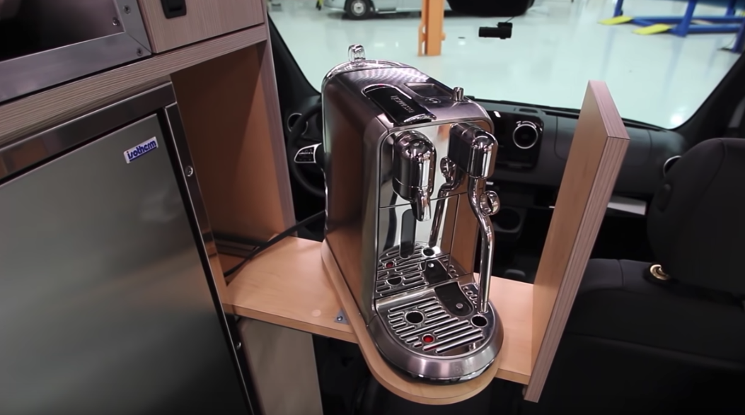 To solve the issue of the steam wand hitting the back of the face panel, Advanced built a swivel for full access to all espresso maker components
